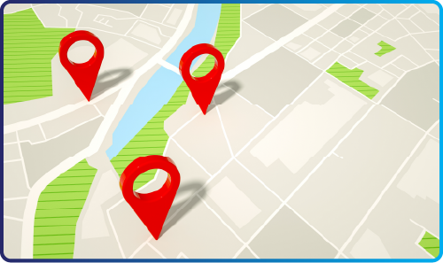 A magnifying glass hovering over a dental practice building.