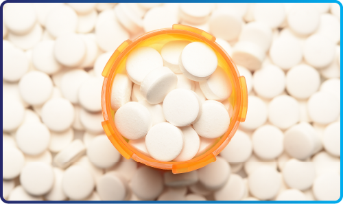 Illustration of pill bottles with a warning symbol, representing opioids in dentistry.